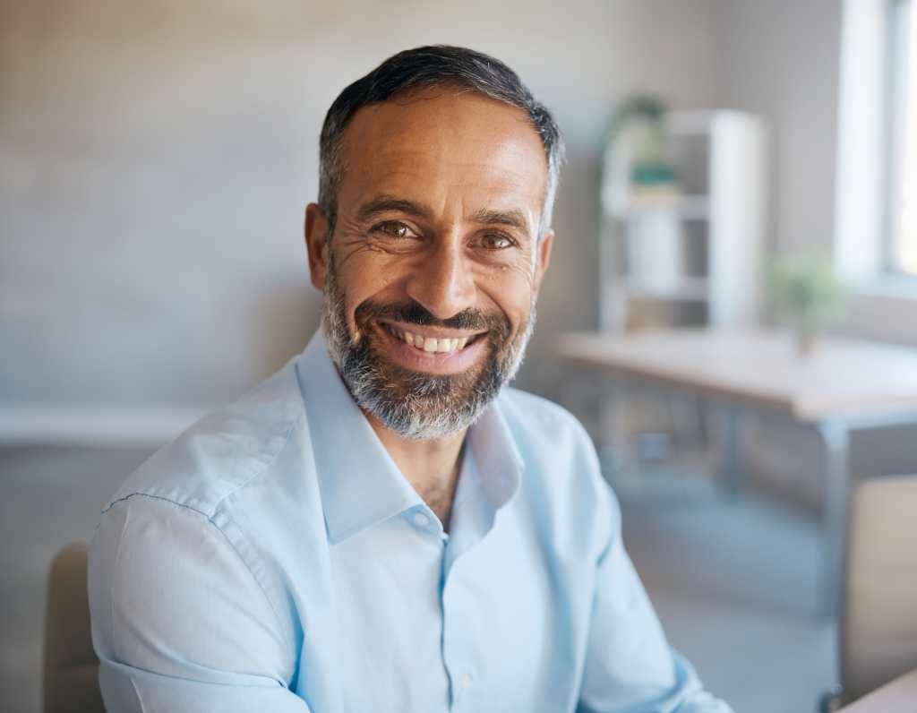 Firefly Professional close up portrait of a friendly Iranian man smiling at the camera mode 861608 1024x796